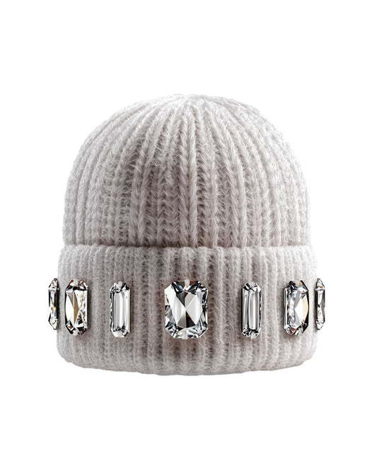 Beige knit beanie with crystal embellishments on a white background